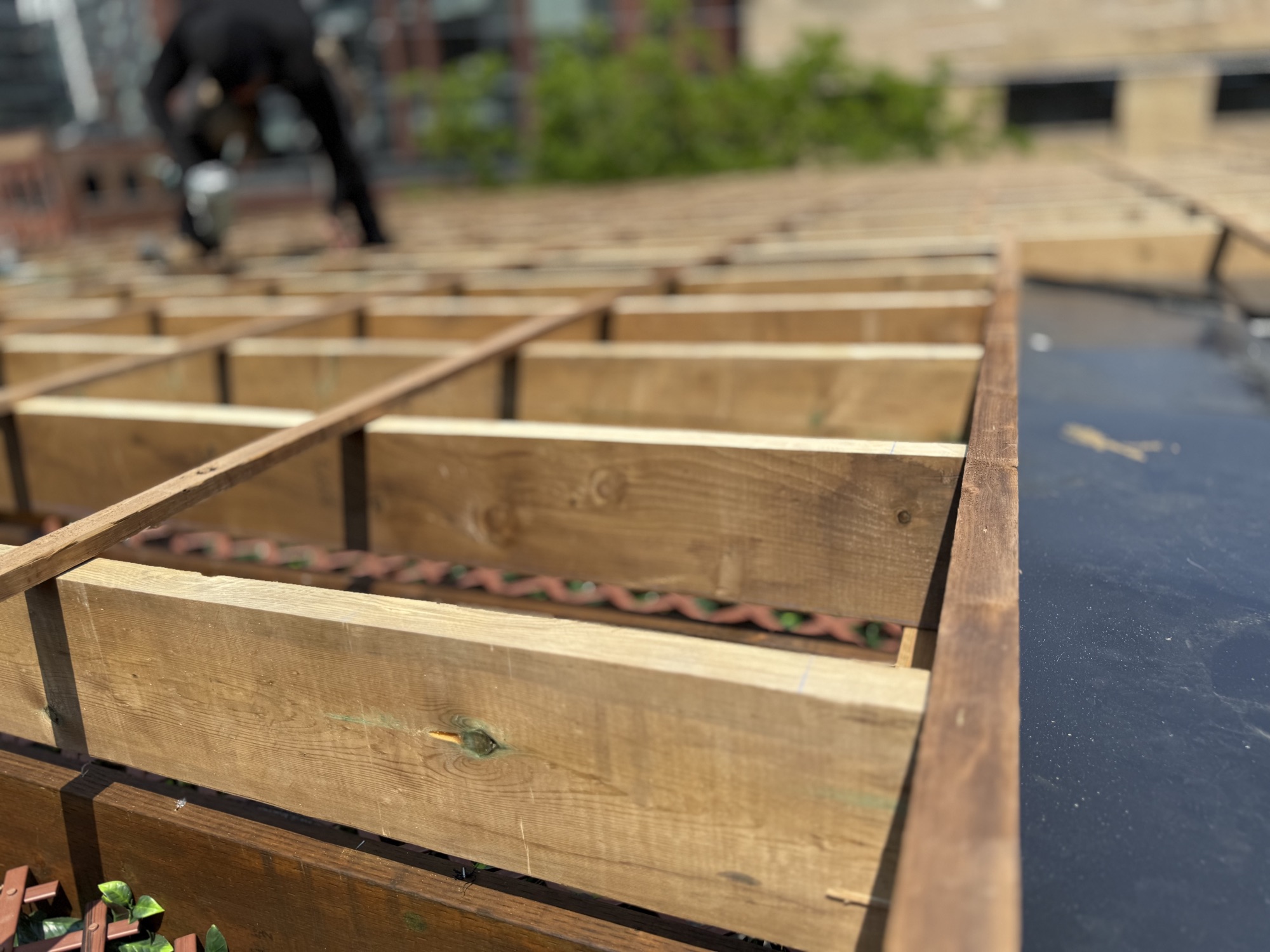 King St. East — rooftop deck sleepers going down