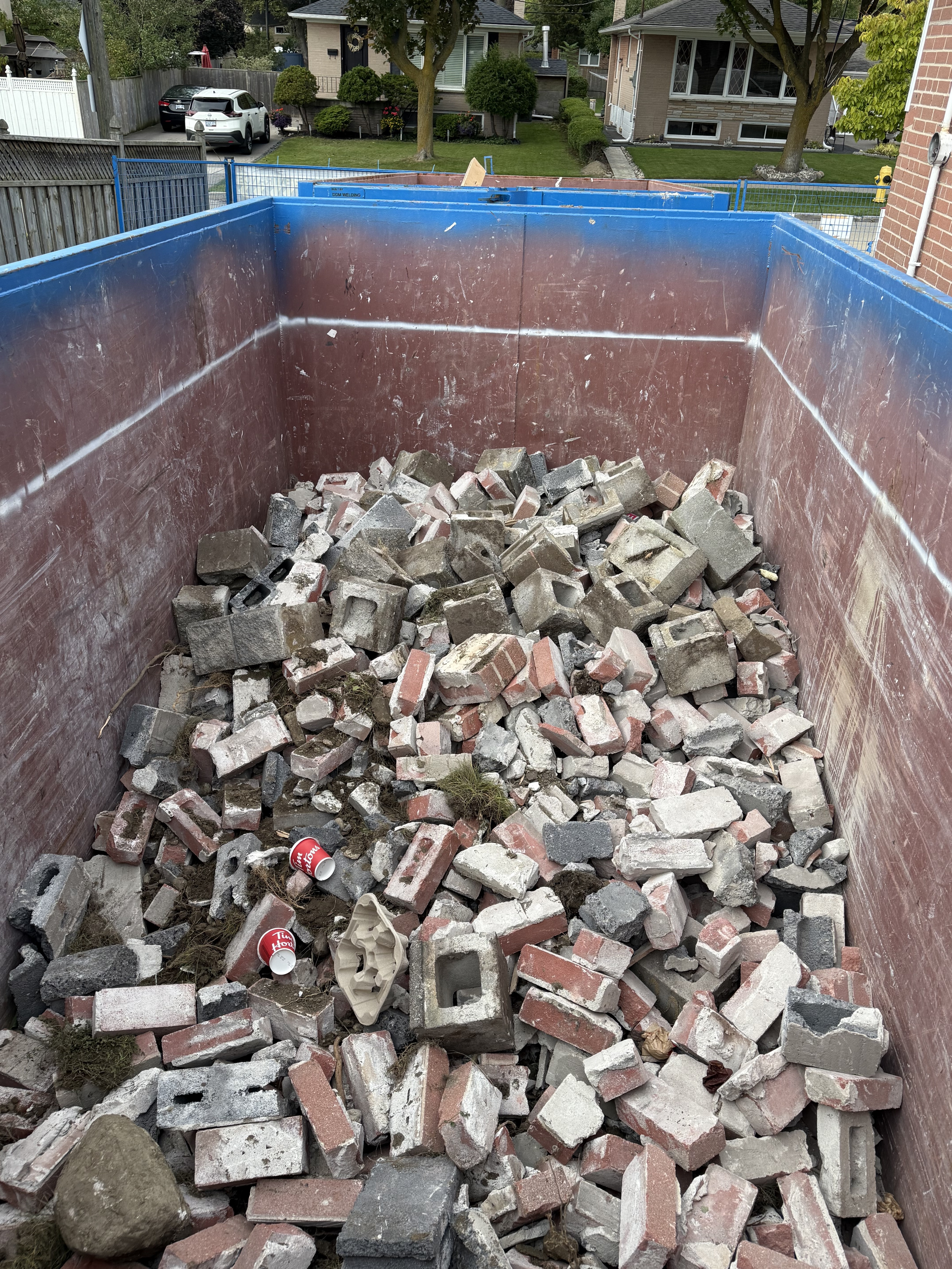 Broken brick and block in the disposal bin