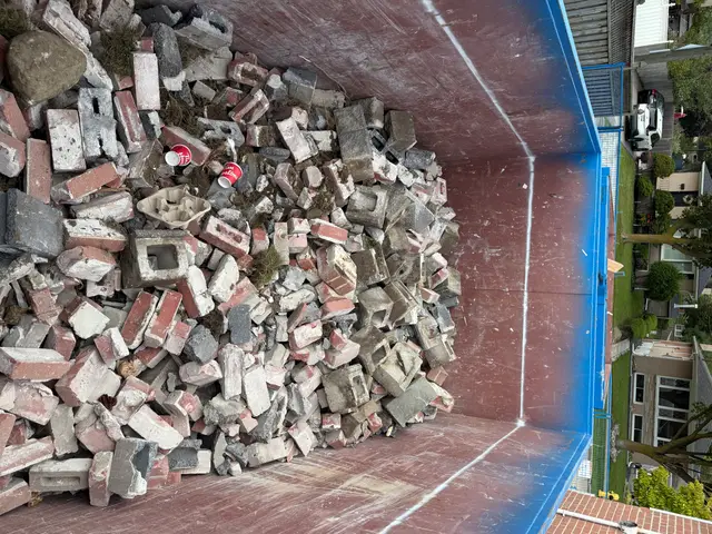 Broken brick and block in the disposal bin