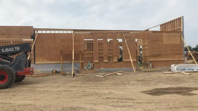 Elora — walls framed and sheathed on the foundation