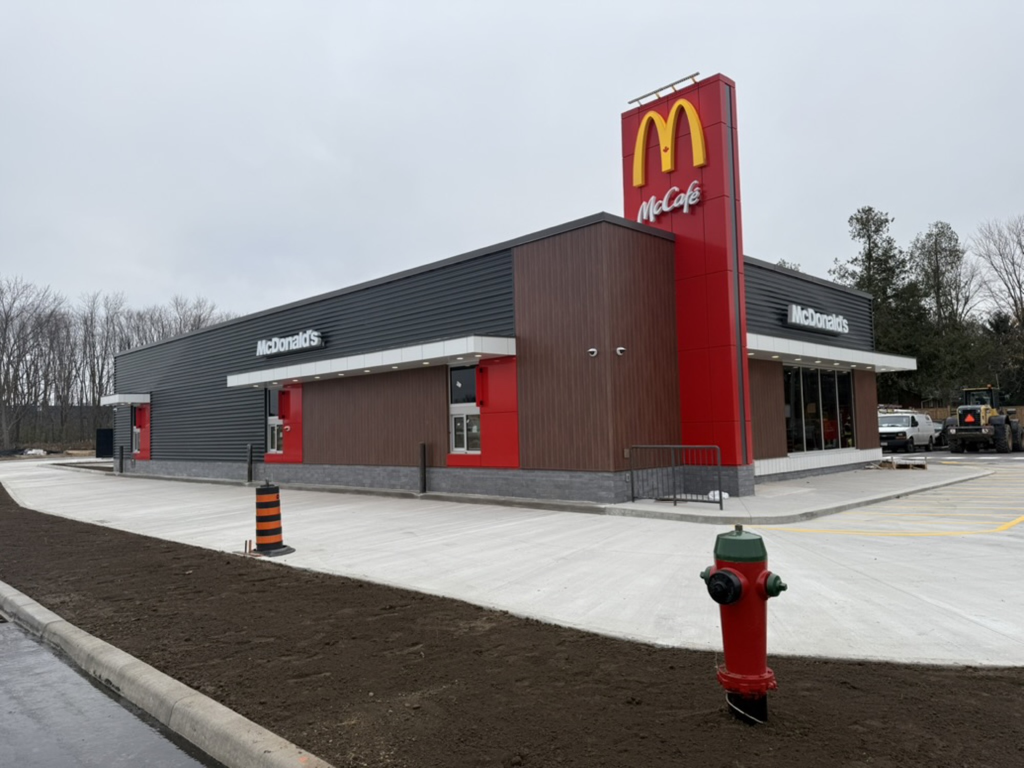 Elora — the finished restaurant building and paved parking lot