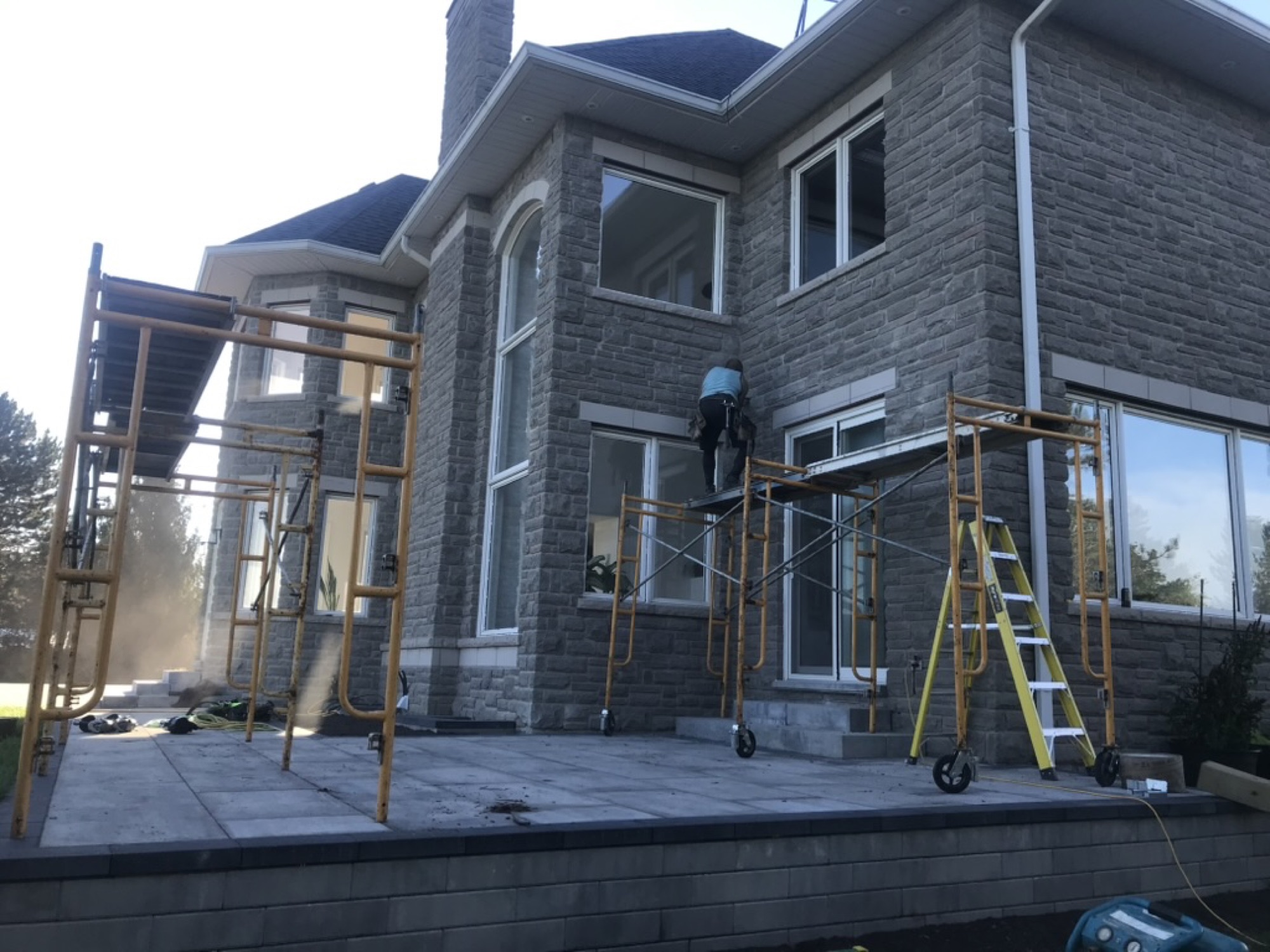 Orangeville — scaffolding set up along the back of the house