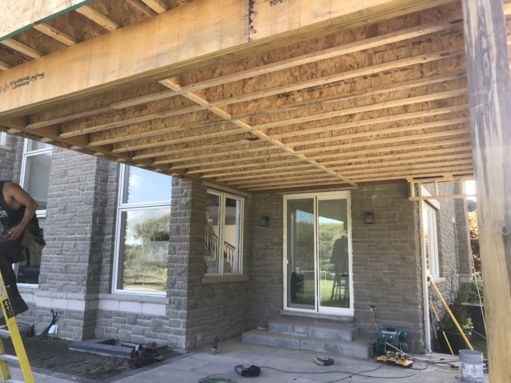 Orangeville — underside of the raised deck, framing and subfloor in